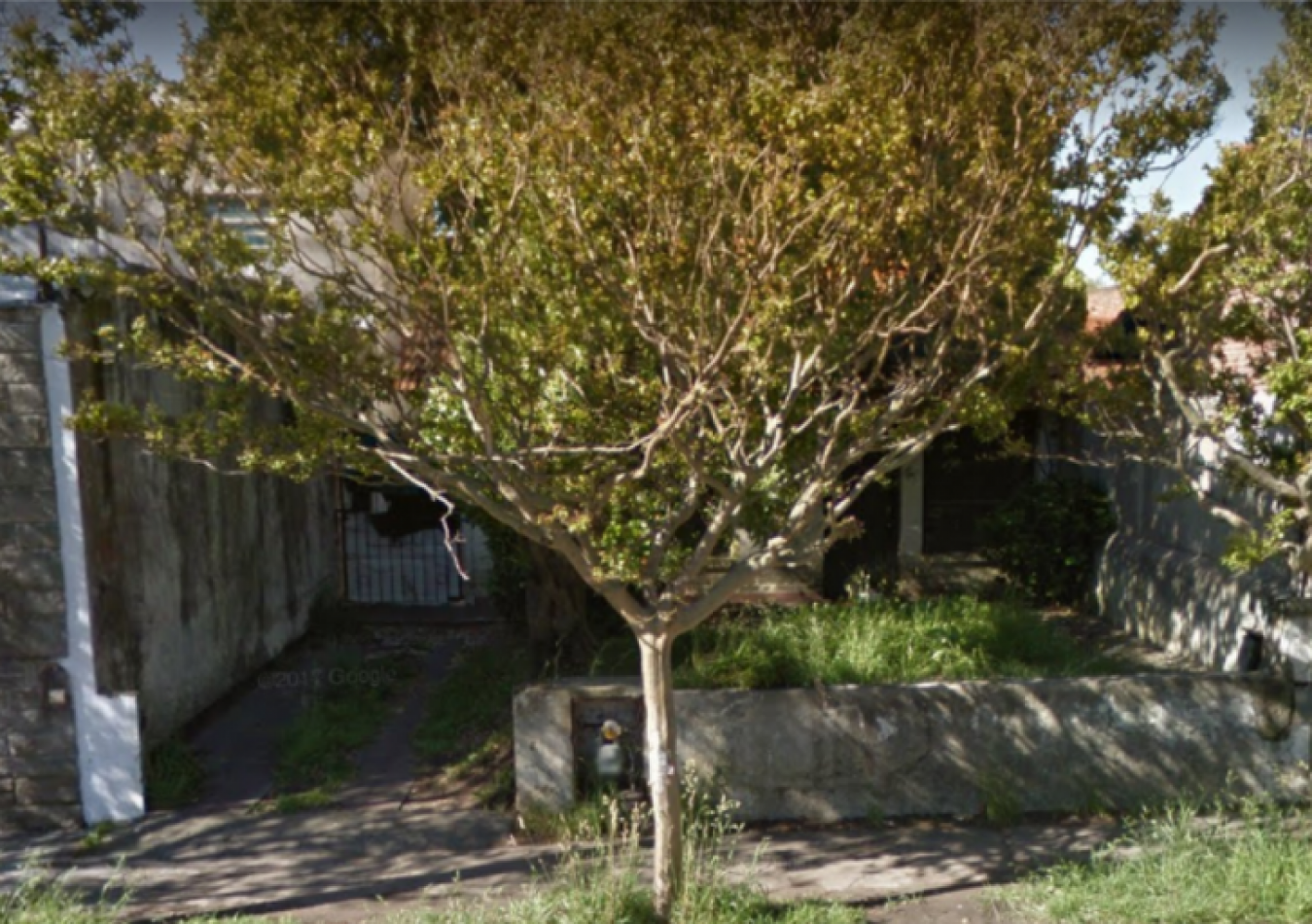 LOTE CON CONSTRUCCION 