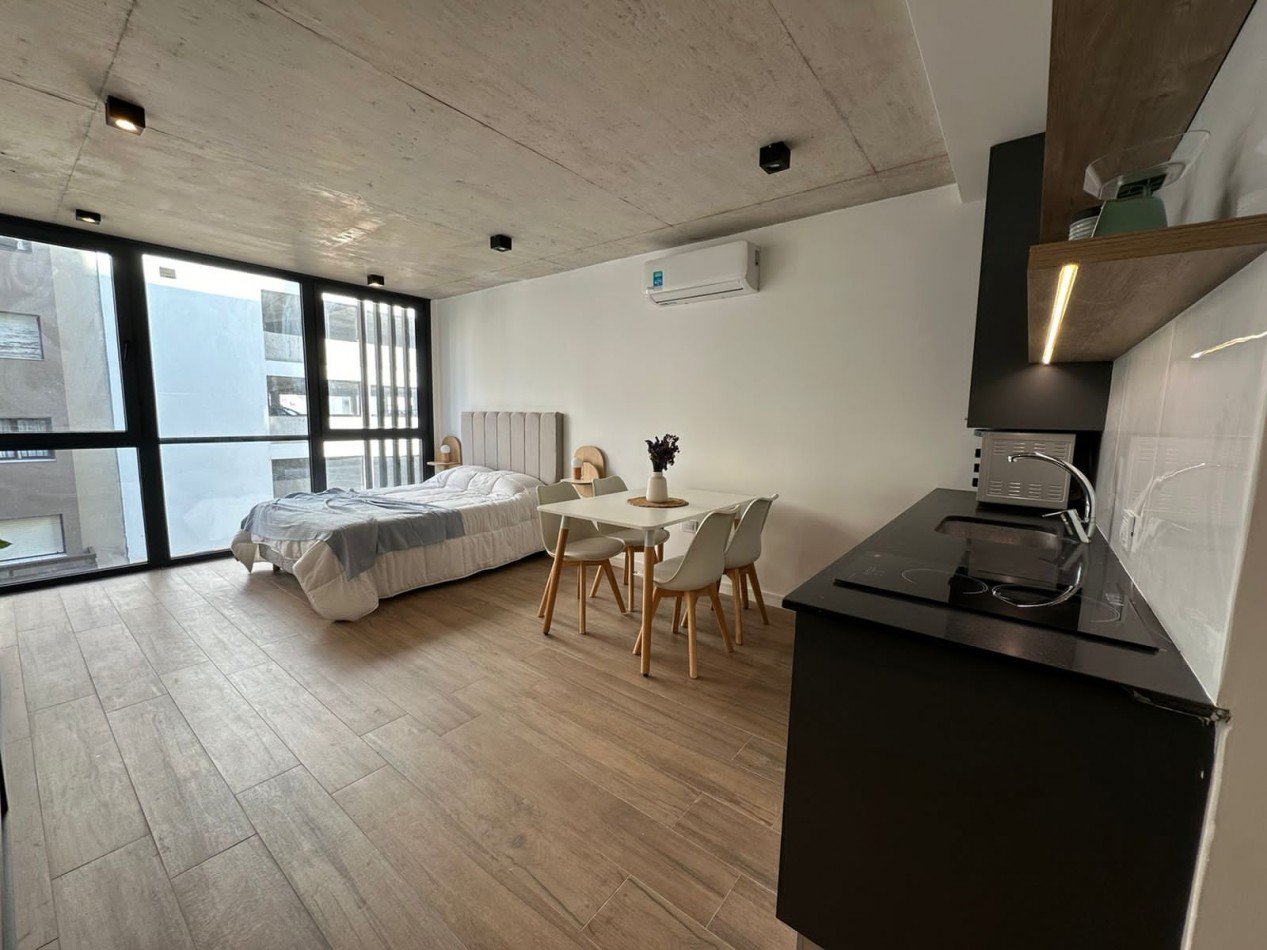 Departamento un ambiente a la calle con balcon 